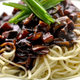 black bean sauce on top of noodles